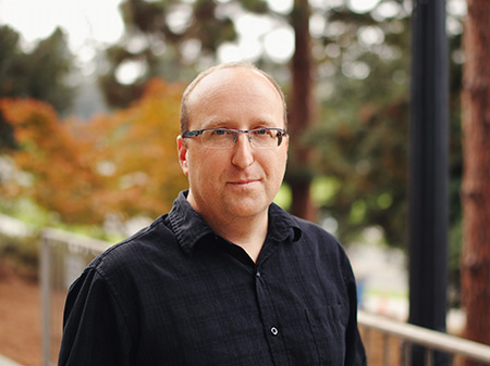 UC Berkeley Professor Michael Yartsev posing outside